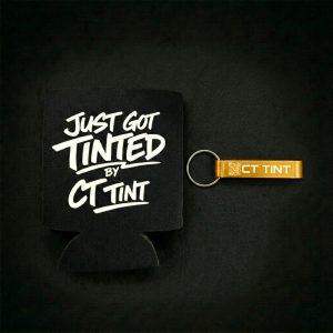 Black Just Got Tinted beer koozy with matching gold bottle opener keychain